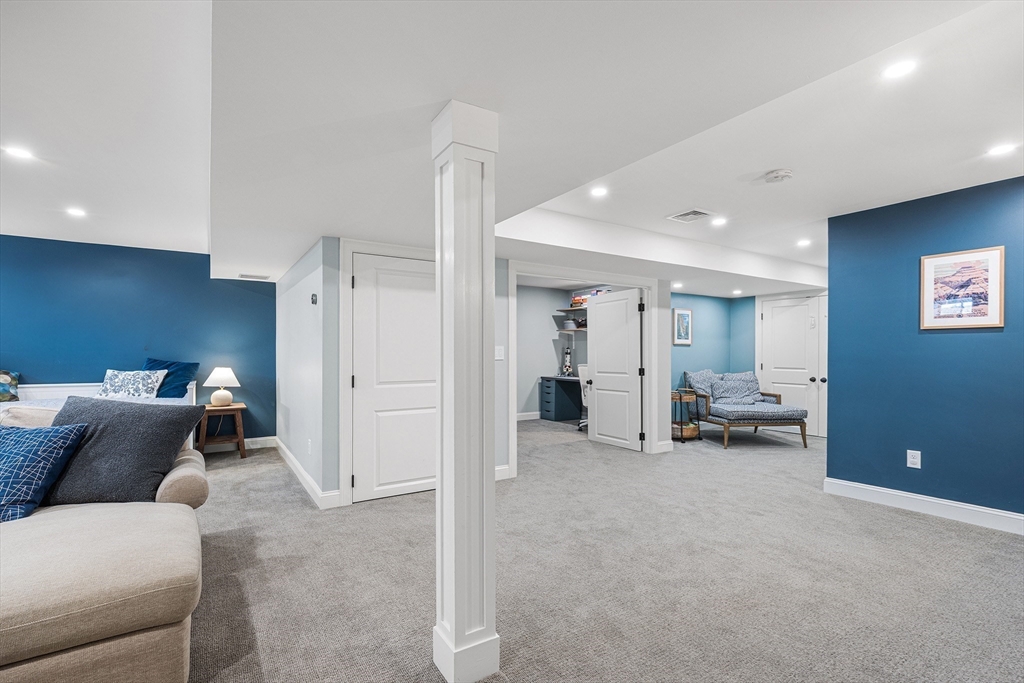 48 Hillcrest Road Waltham, MA 02451 - Photo 33 of 42 a living room with furniture and a couch