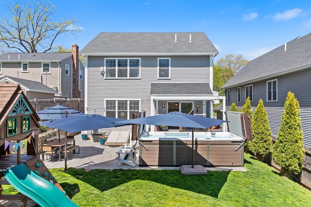 48 Hillcrest Road Waltham, MA 02451 - Photo 39 of 42 a front view of a house with garden and porch