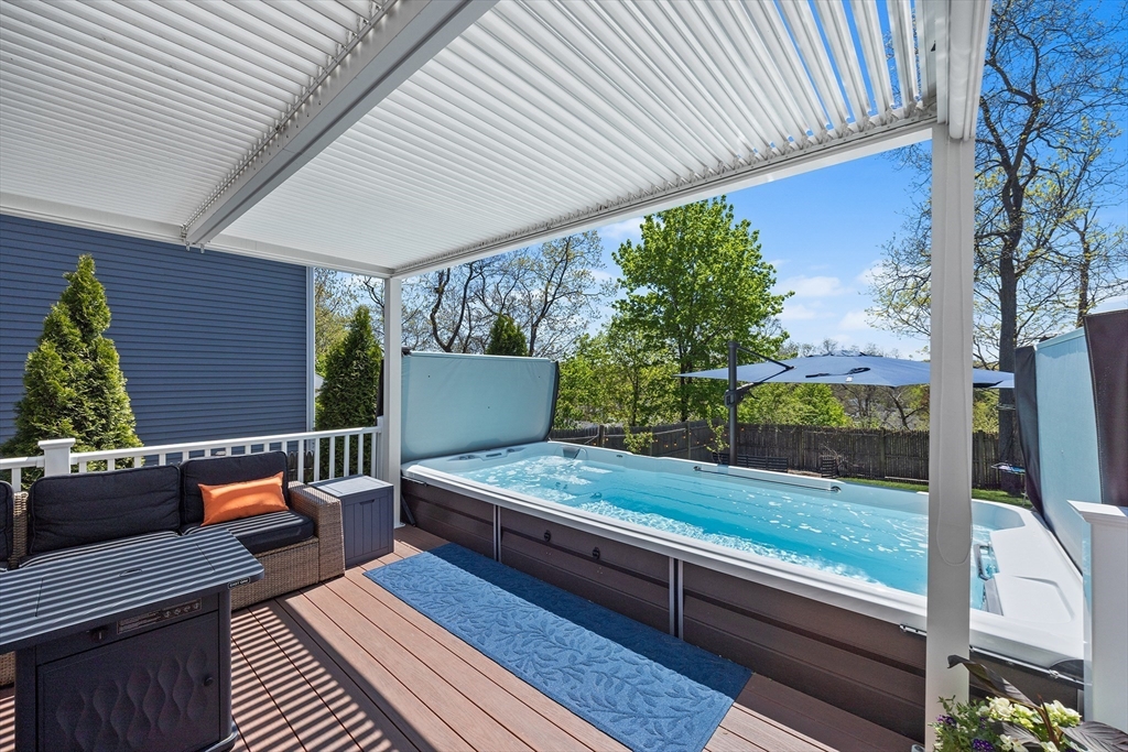 48 Hillcrest Road Waltham, MA 02451 - Photo 7 of 42 a outdoor sitting area with furniture and outdoor view