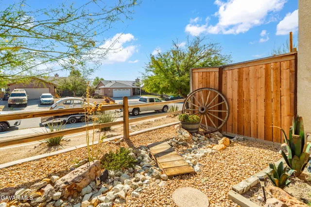 a picture of a yard with table and chairs