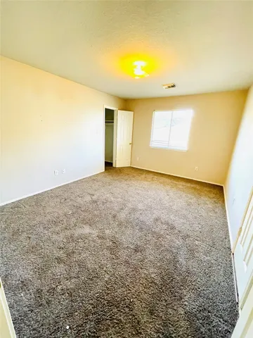 an empty room with a natural light