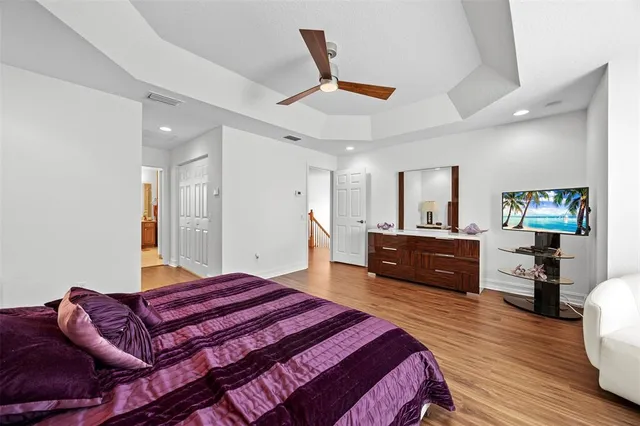 a bedroom with a bed and a cabinets