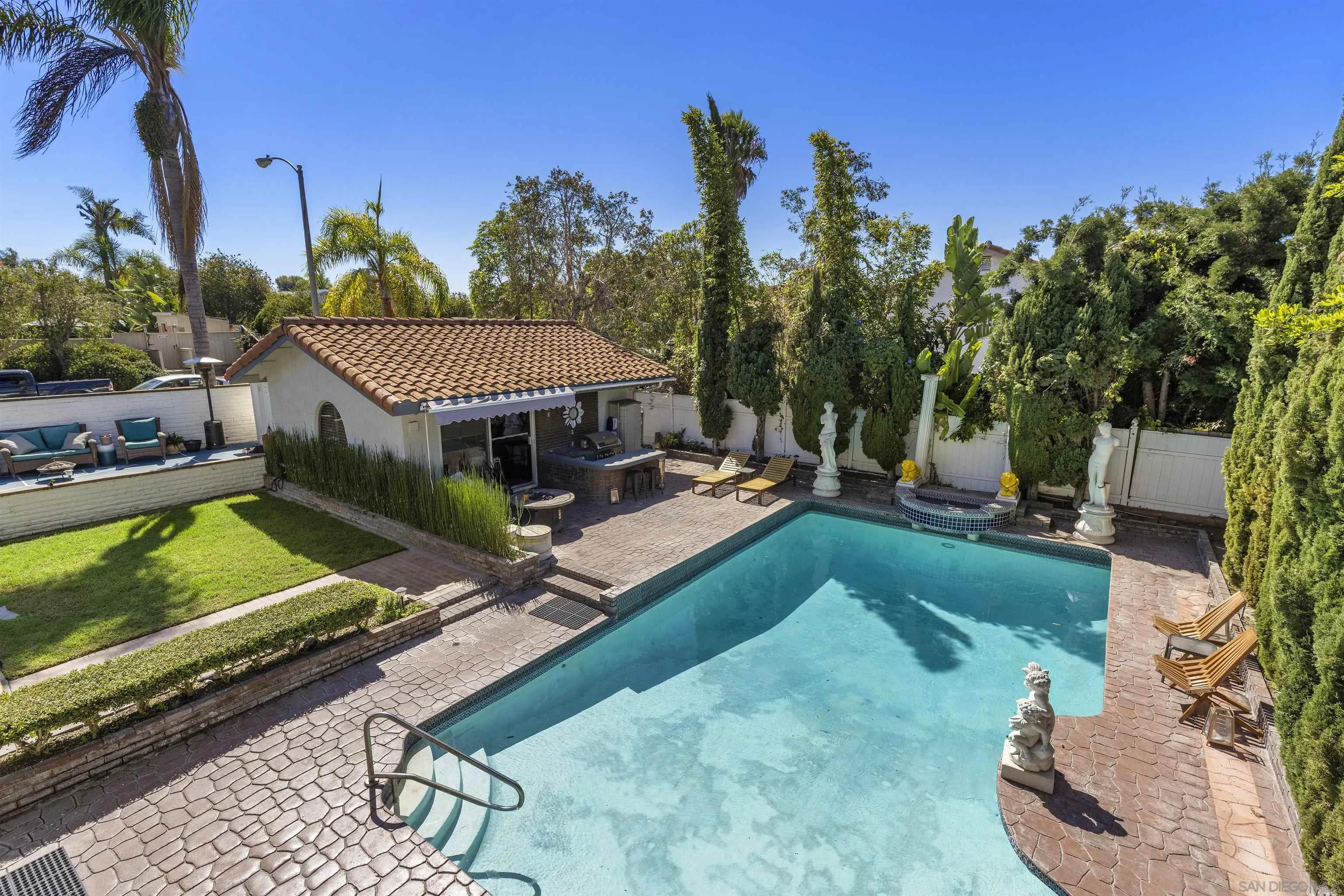 228 Cerro Street Encinitas, CA 92024 - Photo 5 of 9 a view of a house with backyard and sitting area