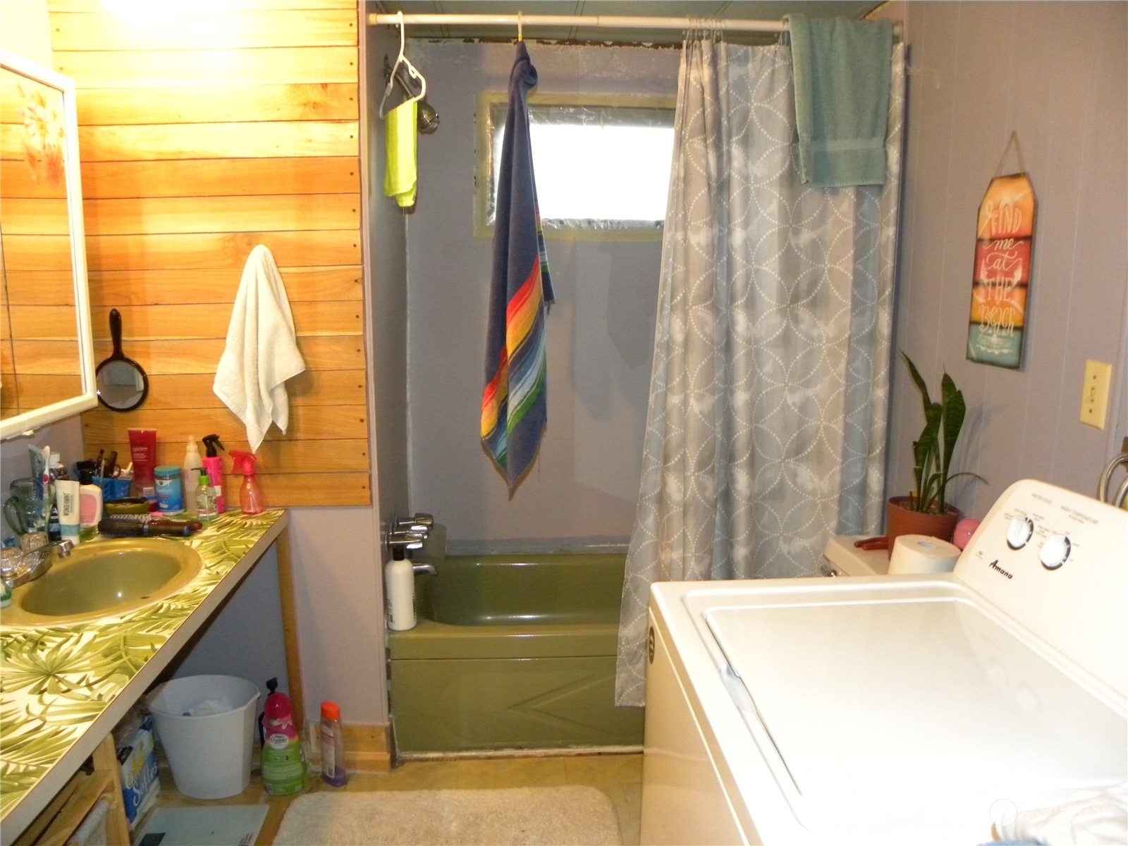 15503 Cedar Park Road Southeast, Unit 14 Olalla, WA 98359 - Photo 14 of 31 a bathroom with a tub sink and mirror