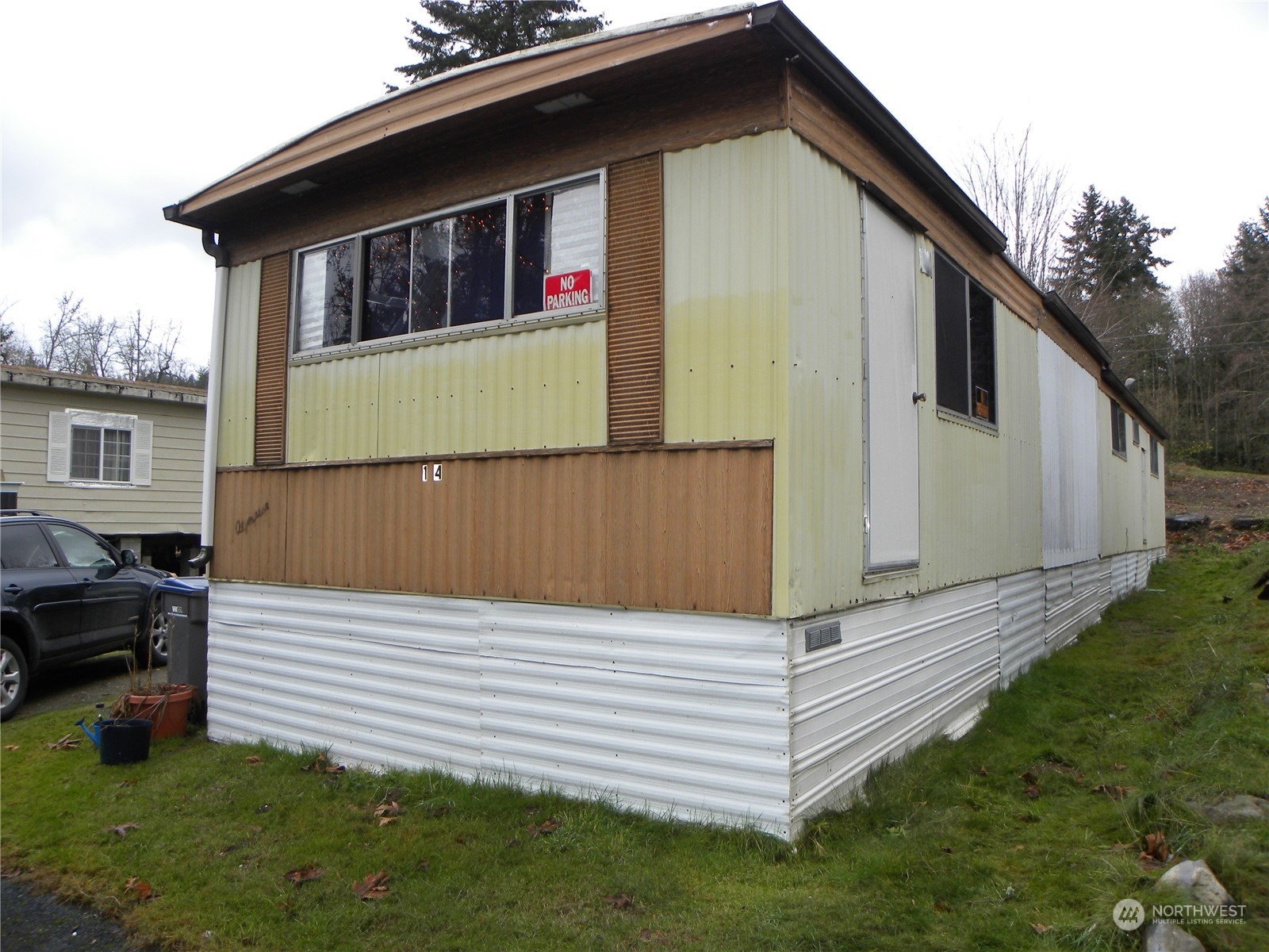 15503 Cedar Park Road Southeast, Unit 14 Olalla, WA 98359 - Photo 19 of 31 a view of a house with a yard