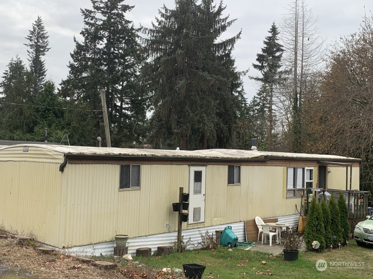 15503 Cedar Park Road Southeast, Unit 14 Olalla, WA 98359 - Photo 30 of 31 a view of a back yard of the house