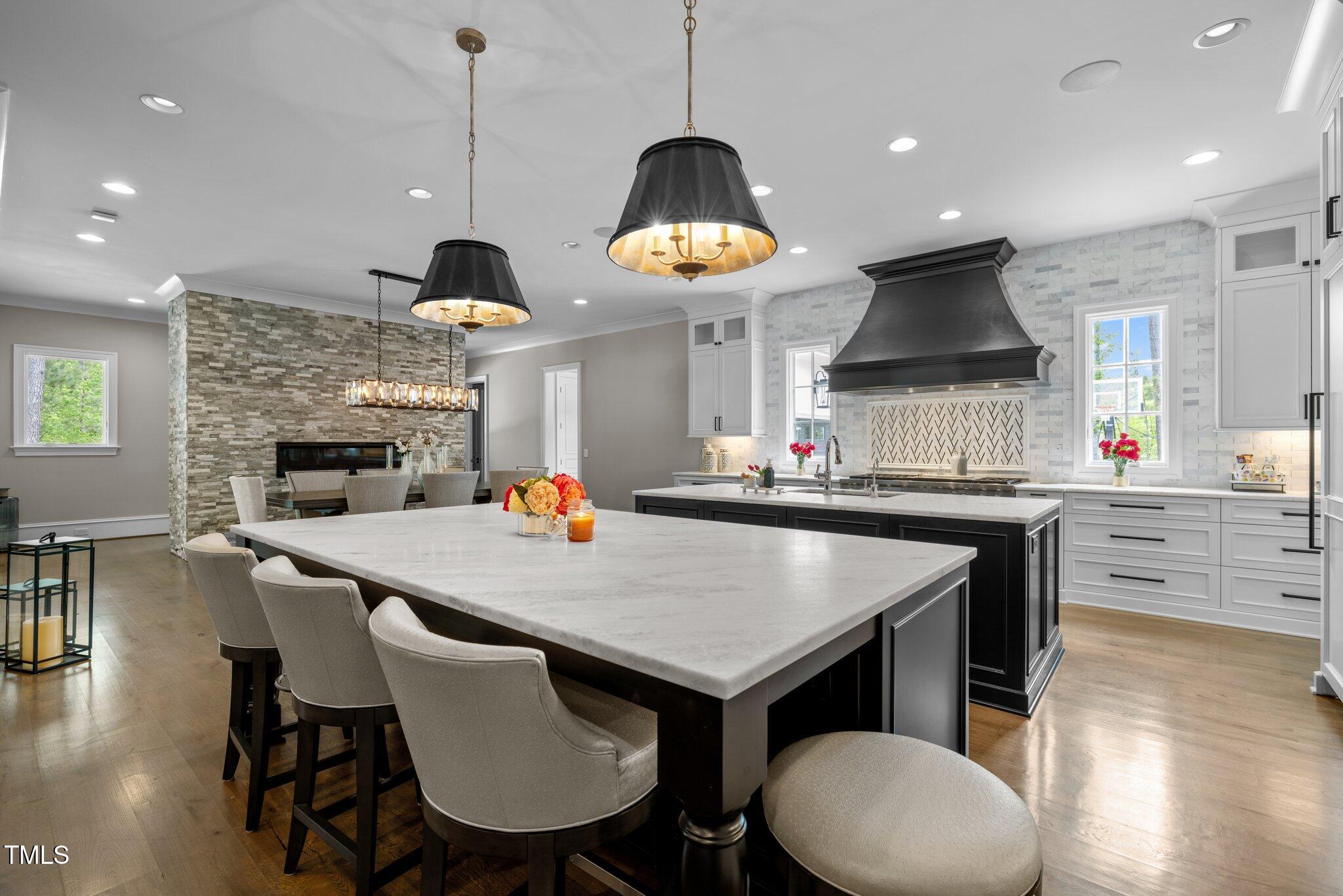 1416 Bailey Hill Drive Raleigh, NC 27614 - Photo 12 of 71 a kitchen with a table and chairs in it