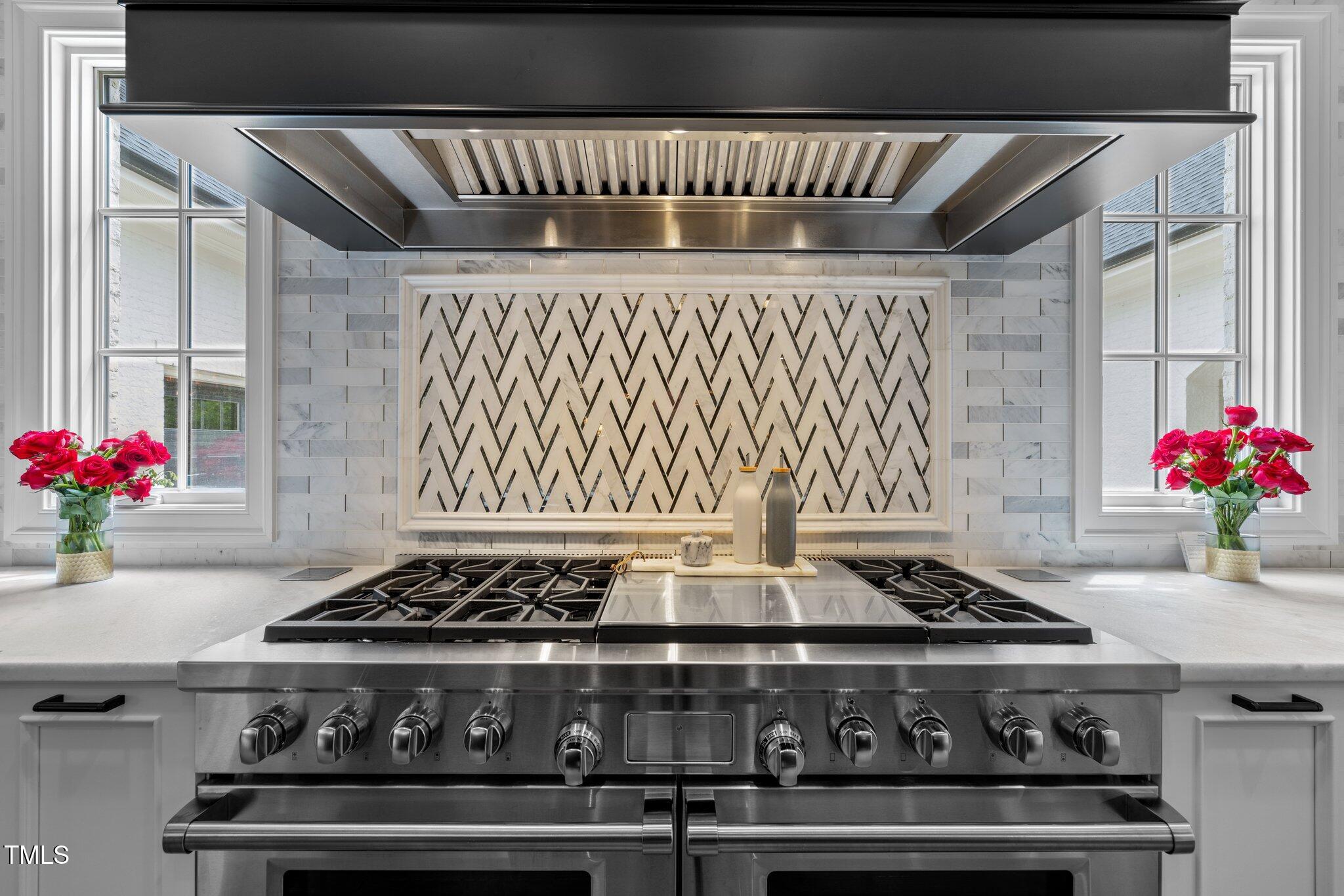 1416 Bailey Hill Drive Raleigh, NC 27614 - Photo 15 of 71 a stove top oven sitting inside of a kitchen