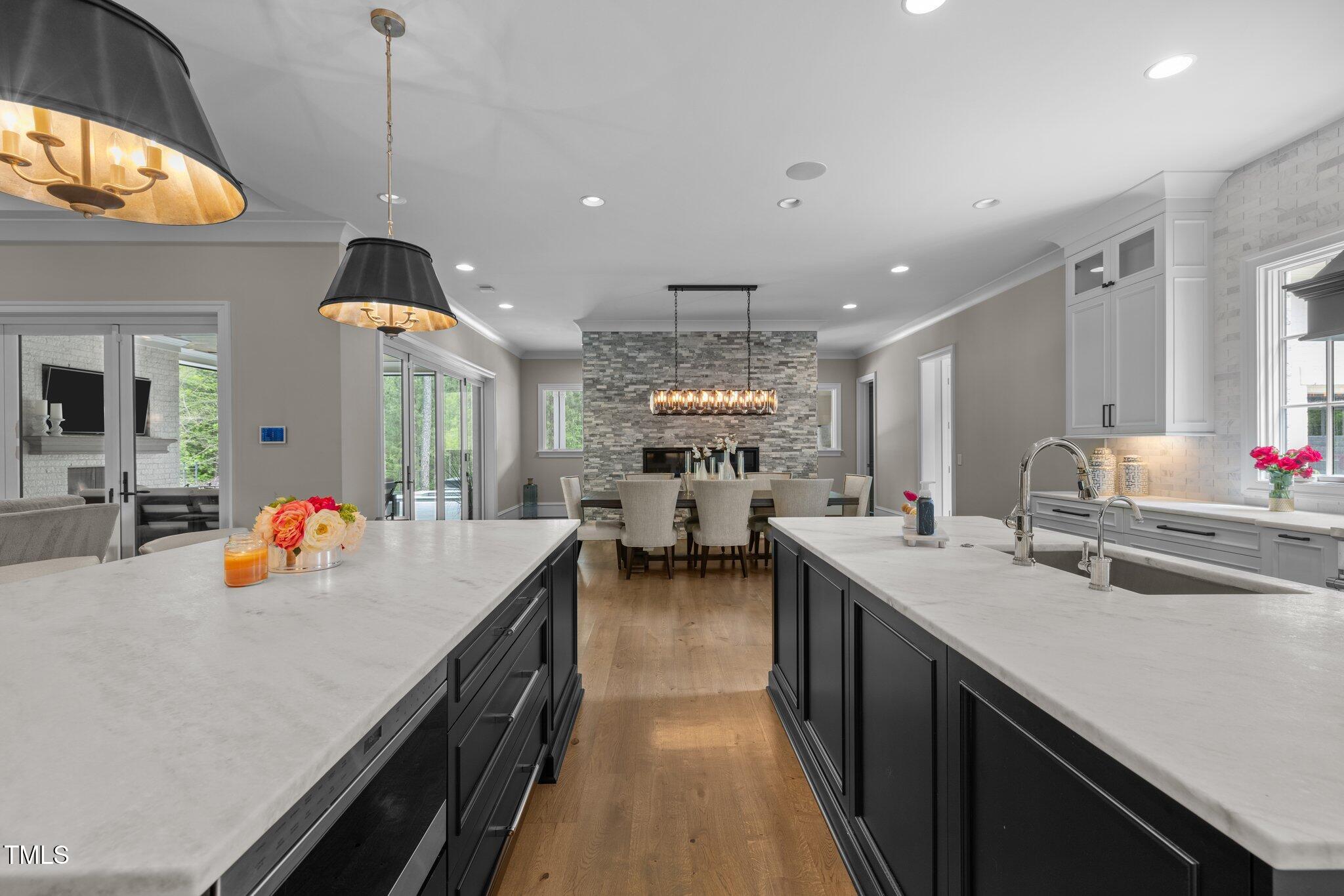 1416 Bailey Hill Drive Raleigh, NC 27614 - Photo 17 of 71 a kitchen with counter top space a sink appliances and cabinets