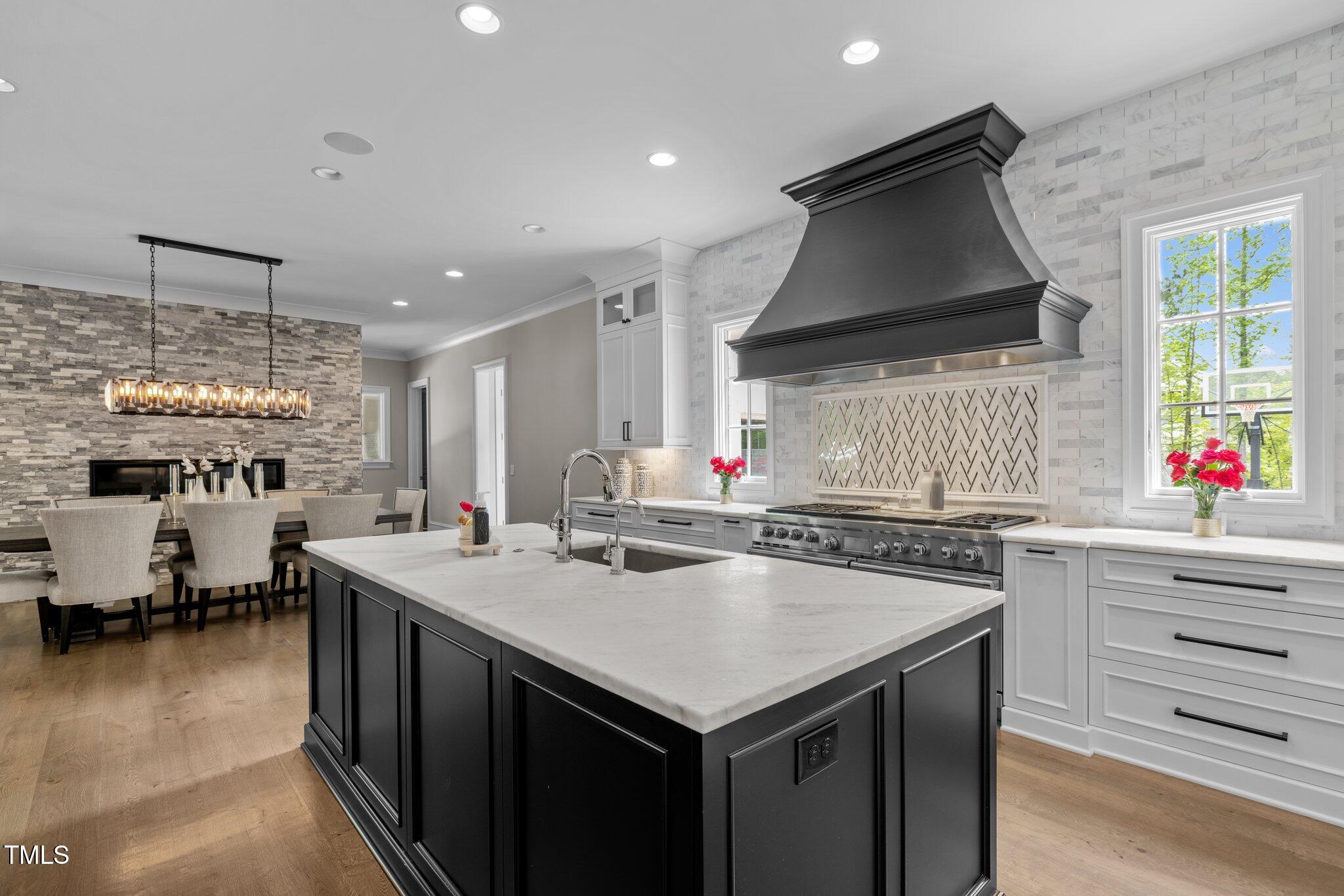 1416 Bailey Hill Drive Raleigh, NC 27614 - Photo 18 of 71 a kitchen with a stove a sink and a refrigerator