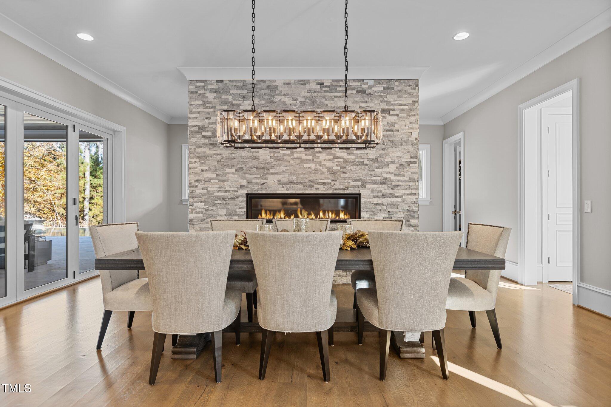 1416 Bailey Hill Drive Raleigh, NC 27614 - Photo 21 of 71 a view of a dining room with furniture window and wooden floor