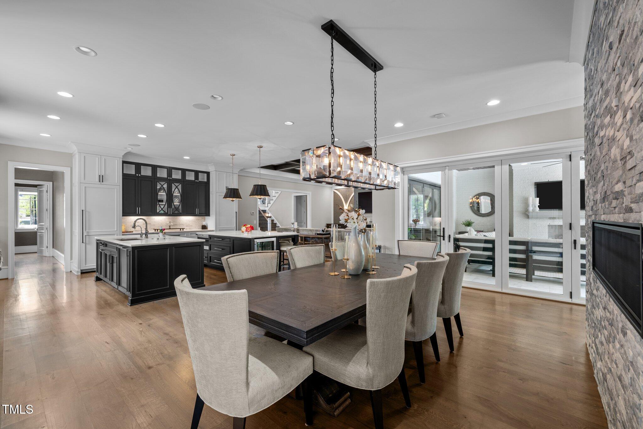 1416 Bailey Hill Drive Raleigh, NC 27614 - Photo 22 of 71 a view of a dining room with furniture and wooden floor
