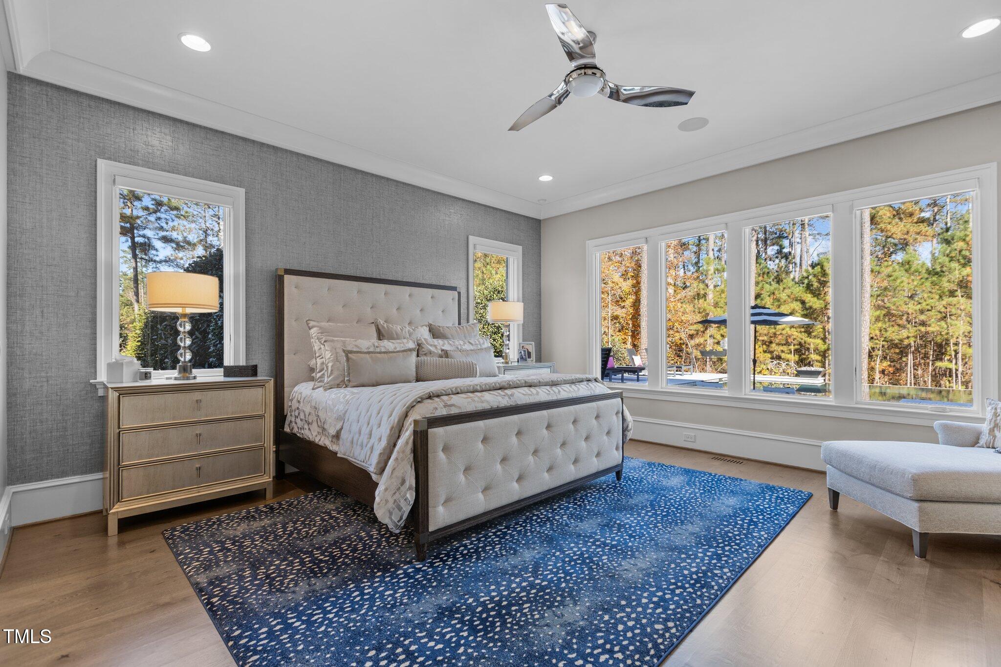 1416 Bailey Hill Drive Raleigh, NC 27614 - Photo 31 of 71 a bedroom with a large bed and a couch