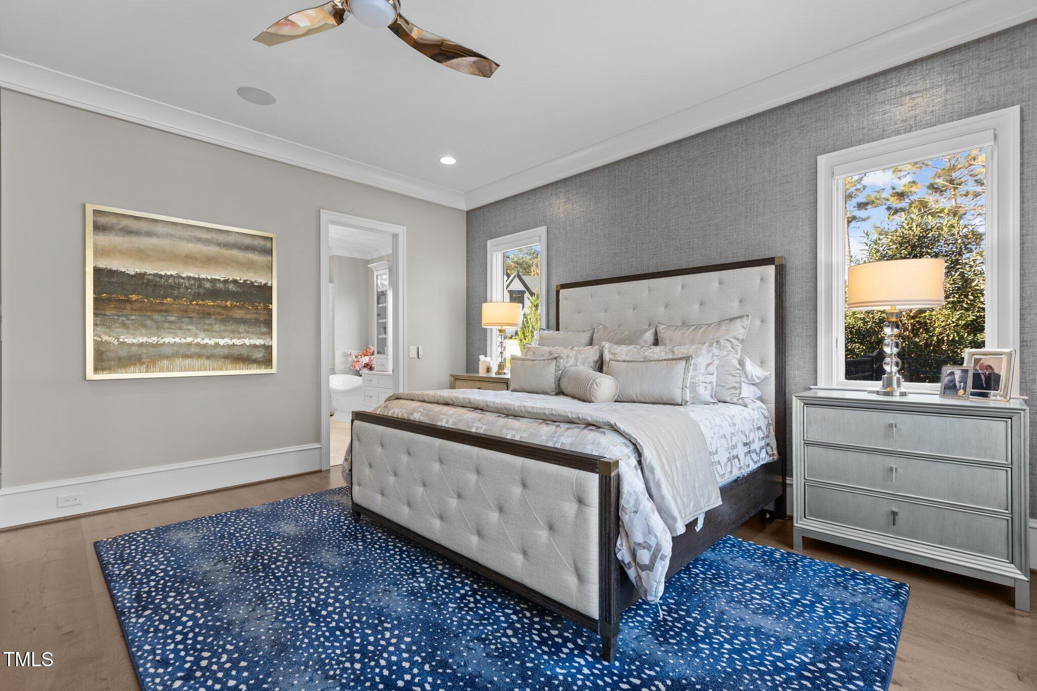 1416 Bailey Hill Drive Raleigh, NC 27614 - Photo 32 of 71 a spacious bedroom with a bed and a window