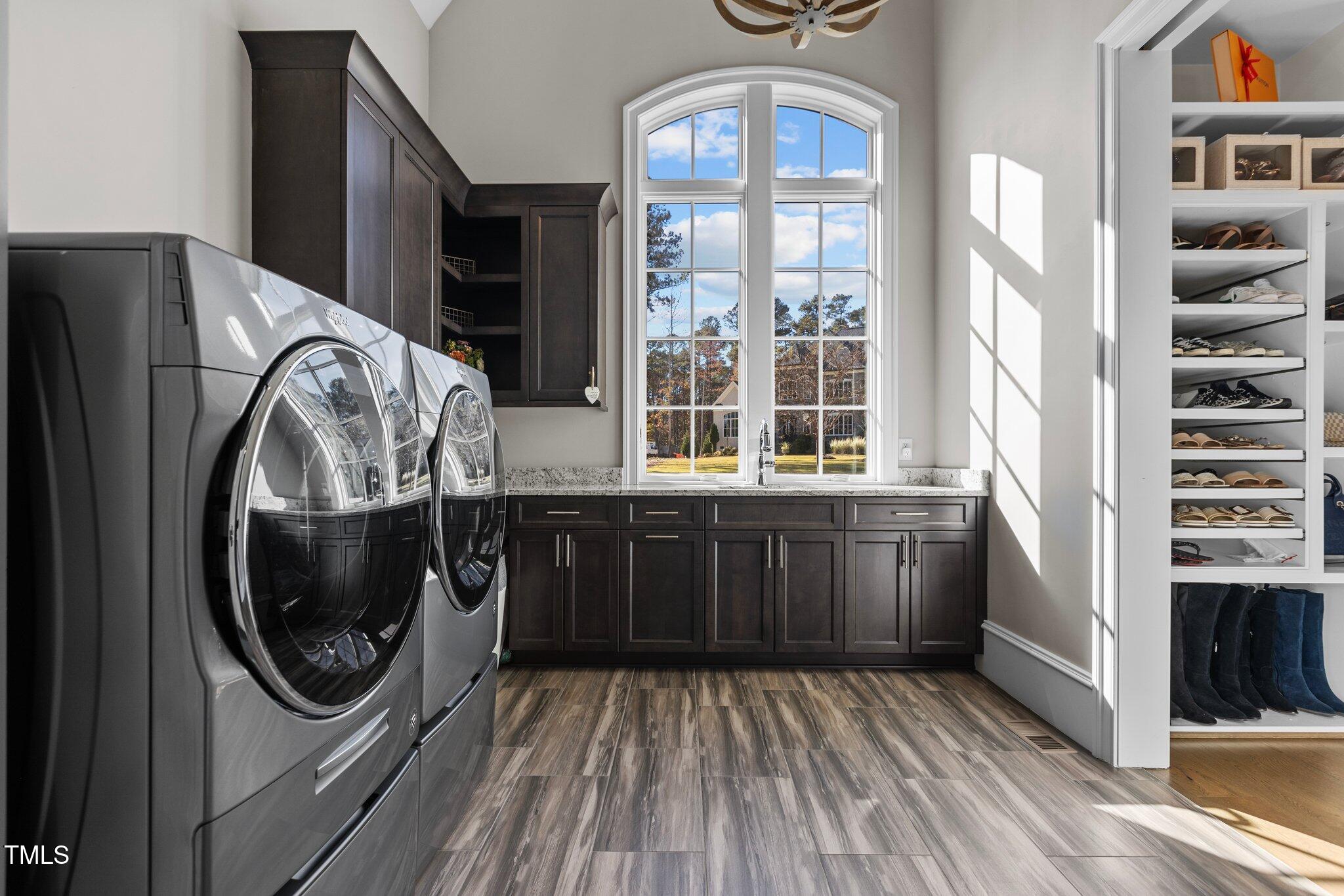 1416 Bailey Hill Drive Raleigh, NC 27614 - Photo 37 of 71 a view of a hallway with washer and dryer