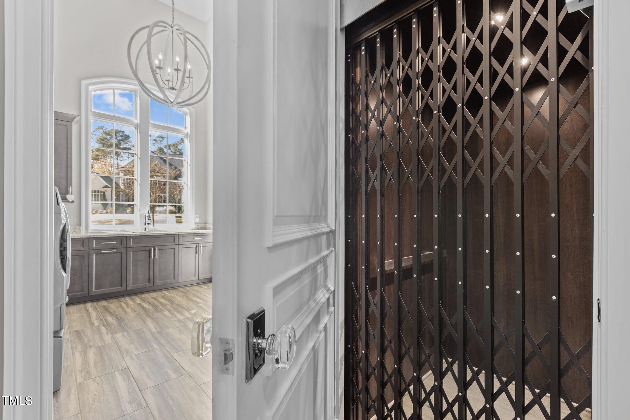 1416 Bailey Hill Drive Raleigh, NC 27614 - Photo 38 of 71 a view of a door and wooden floor