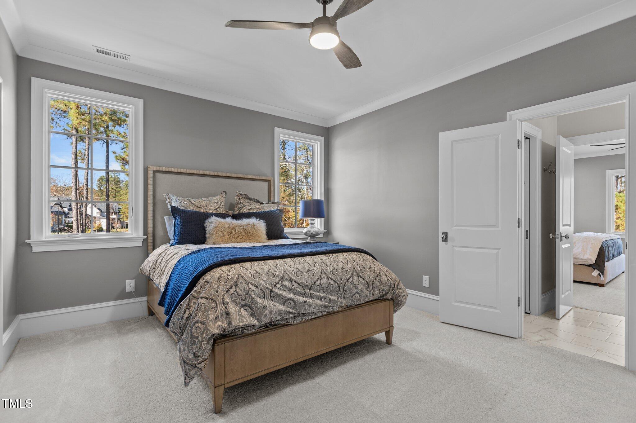 1416 Bailey Hill Drive Raleigh, NC 27614 - Photo 46 of 71 a bedroom with a bed and window