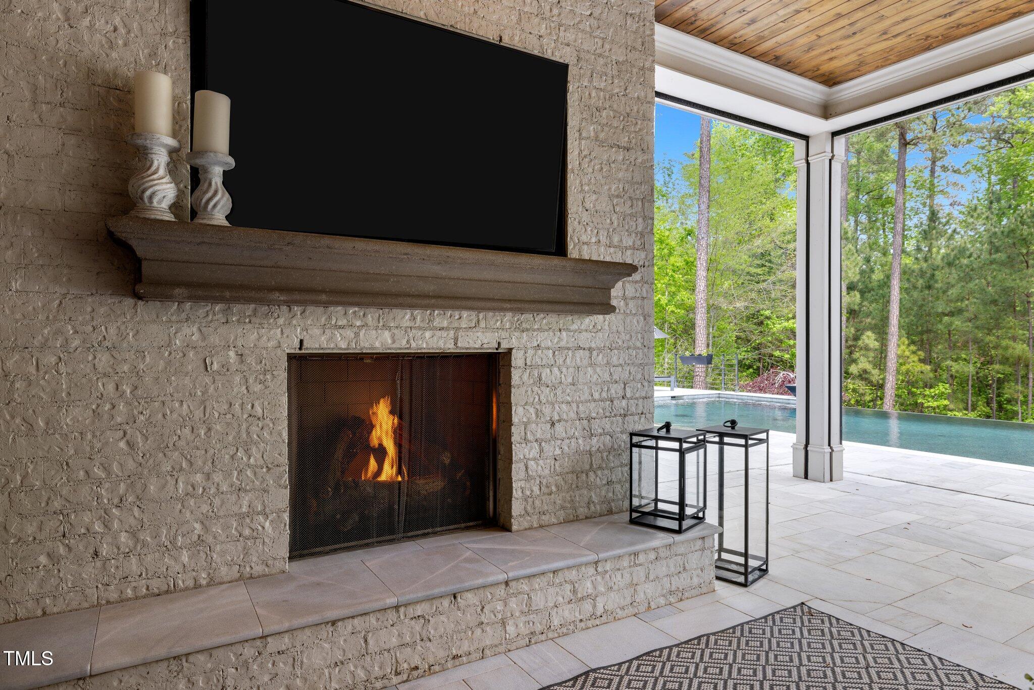 1416 Bailey Hill Drive Raleigh, NC 27614 - Photo 53 of 71 a living room with furniture and a fireplace