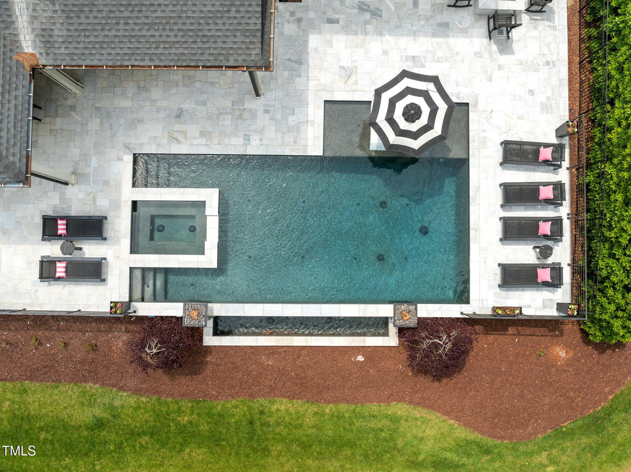 1416 Bailey Hill Drive Raleigh, NC 27614 - Photo 57 of 71 a view of a street with brick wall and a large tree