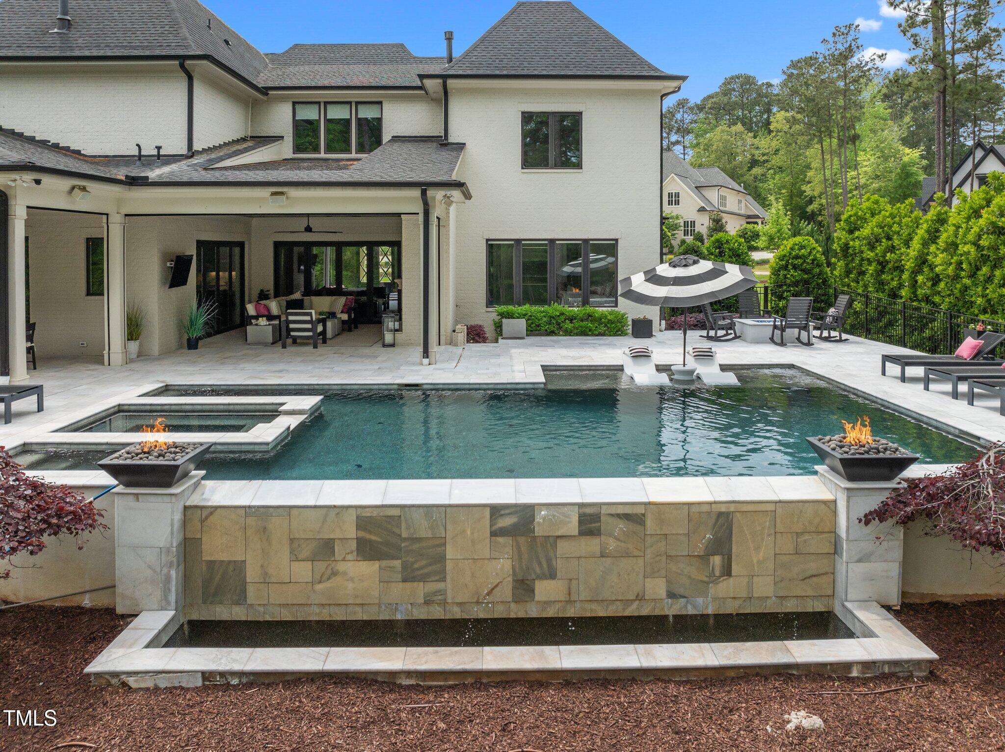 1416 Bailey Hill Drive Raleigh, NC 27614 - Photo 59 of 71 a view of a swimming pool with a patio