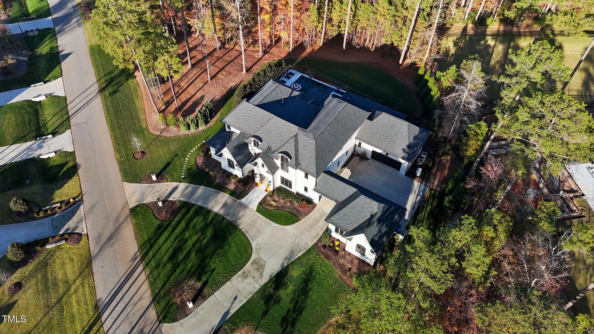 1416 Bailey Hill Drive Raleigh, NC 27614 - Photo 67 of 71 an aerial view of a house with a yard and potted plants