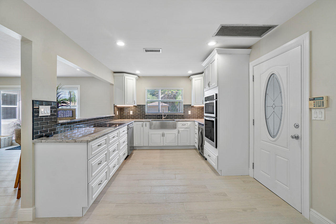 319 Bamboo Road West Palm Beach, FL 33404 - Photo 3 of 46 009-319BambooRd-PalmBeachGardens-FL-smal