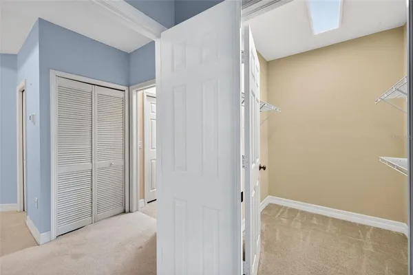 a bathroom with a sink mirror toilet and bathtub