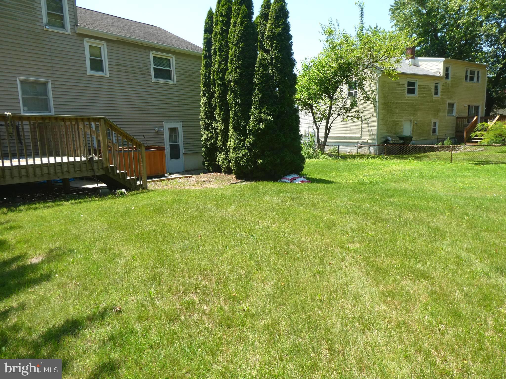 2 Pineview Avenue Berlin, NJ 08009 - Photo 16 of 19 a view of a house with a yard and a garage