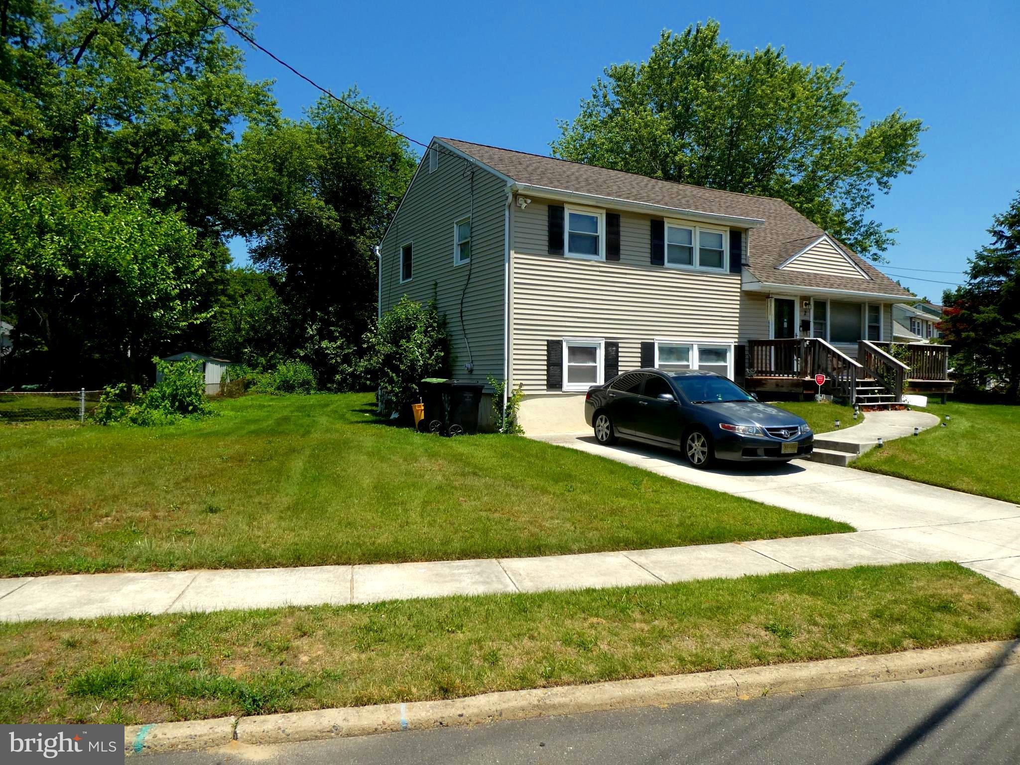 2 Pineview Avenue Berlin, NJ 08009 - Photo 2 of 19 a front view of a house with a yard