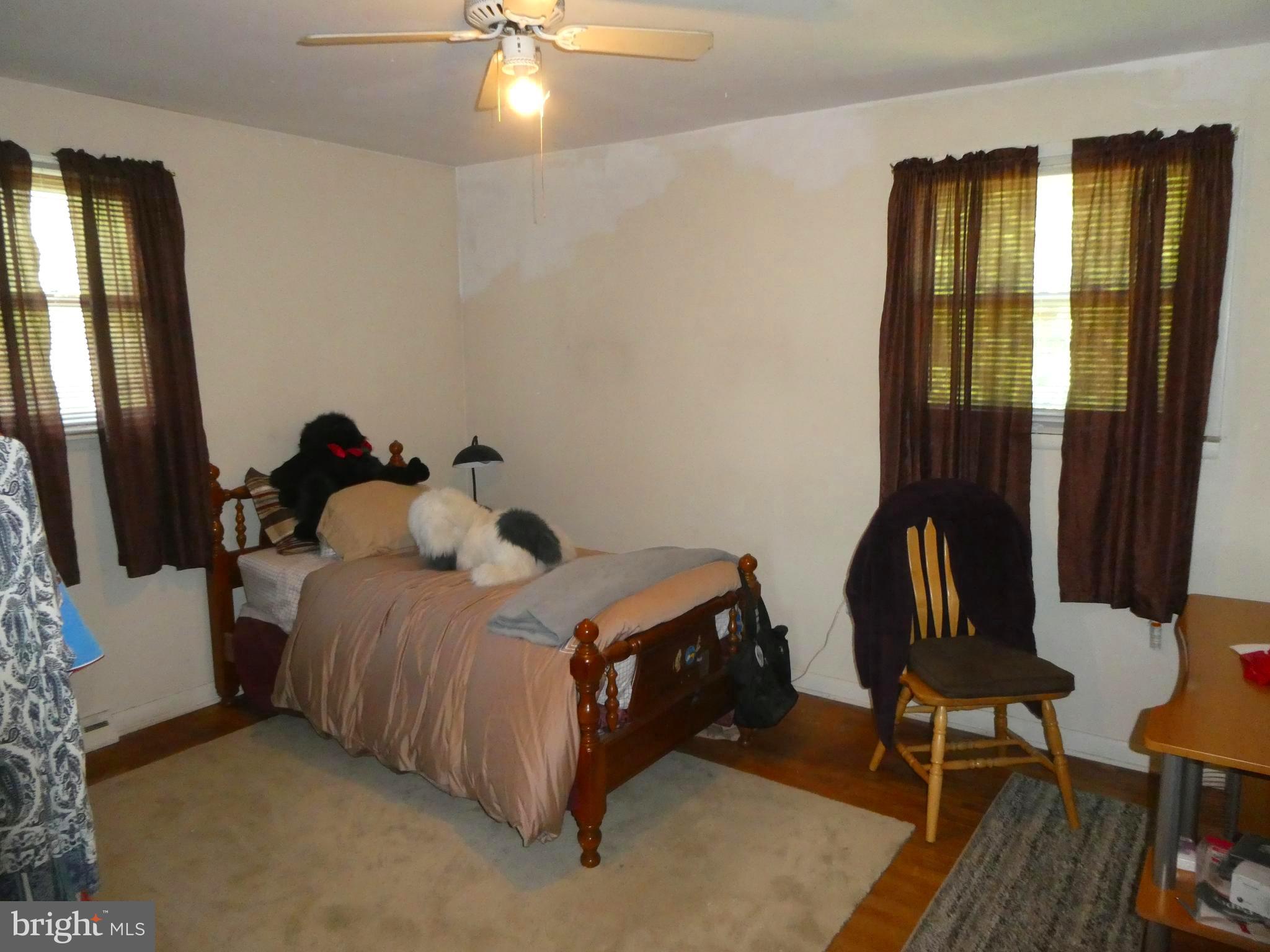 2 Pineview Avenue Berlin, NJ 08009 - Photo 10 of 19 a bed room with a bed and a chair