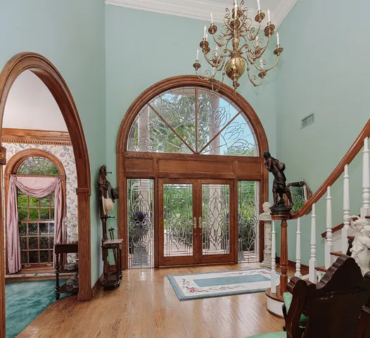 a view of hall way with furniture