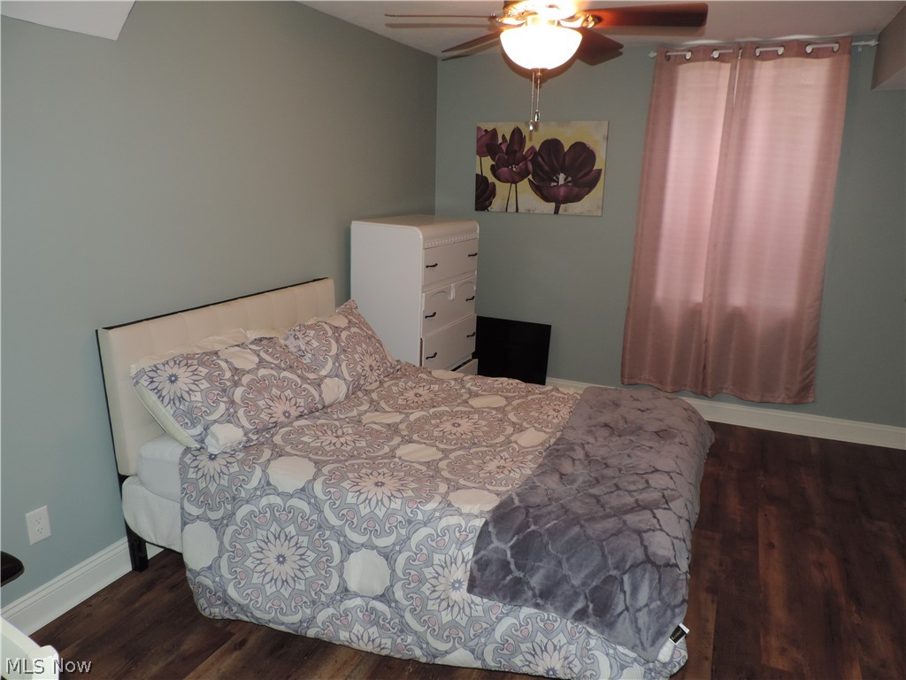 24770 Maple Ridge Road Westlake, OH 44145 - Photo 17 of 26 Bedroom featuring dark hardwood / wood-style flooring and ceiling fan