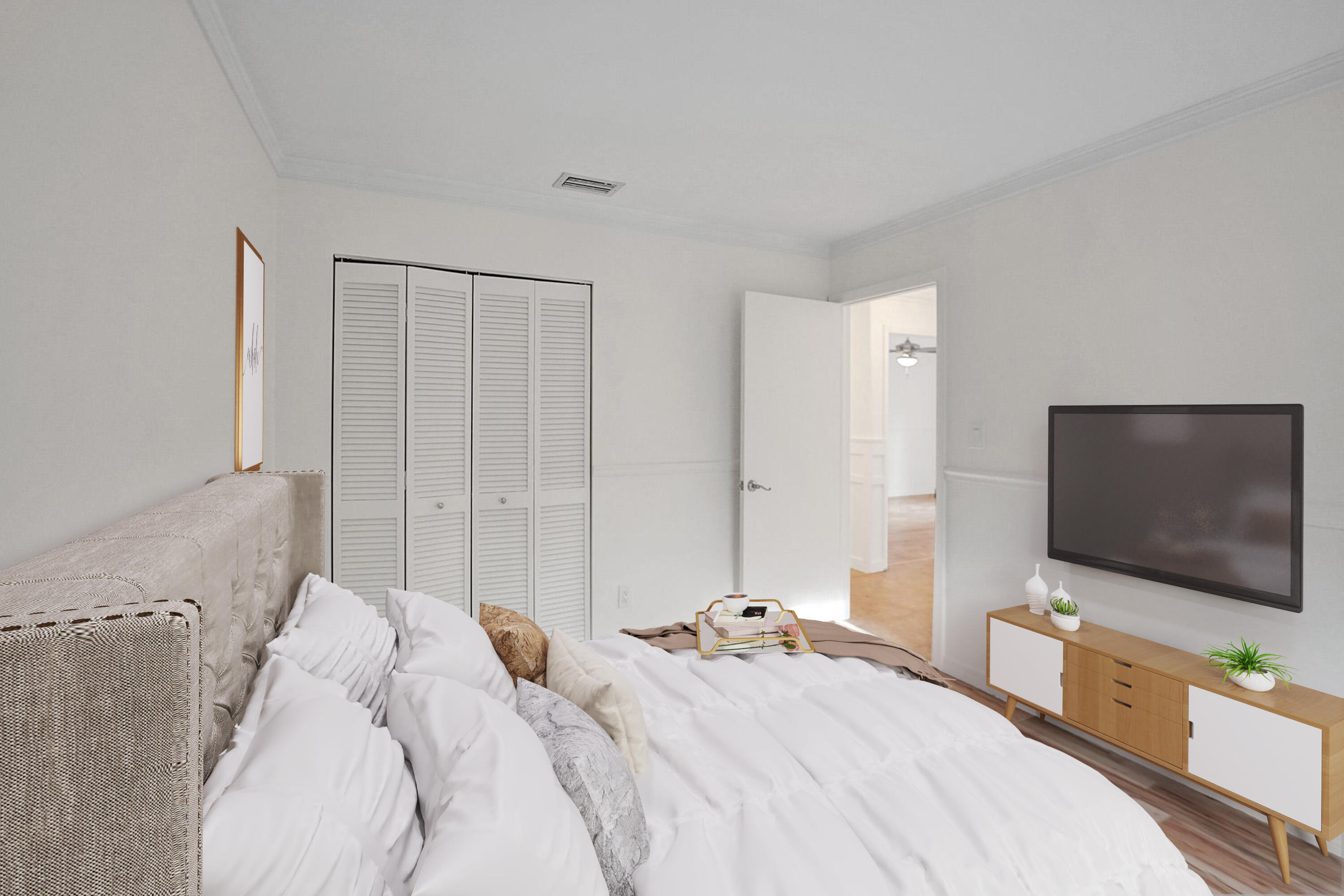 2941 Northwest 24th Way Boca Raton, FL 33431 - Photo 35 of 53 a bedroom with a flat screen tv and a bed