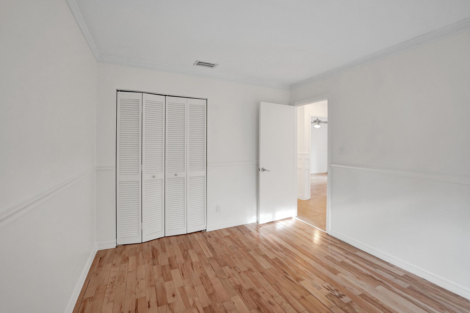 2941 Northwest 24th Way Boca Raton, FL 33431 - Photo 36 of 53 a view of hallway with wooden floor