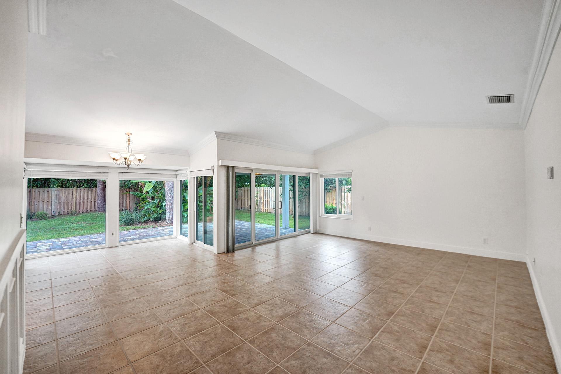 2941 Northwest 24th Way Boca Raton, FL 33431 - Photo 7 of 53 a view of porch with a floor to ceiling window and an entrance