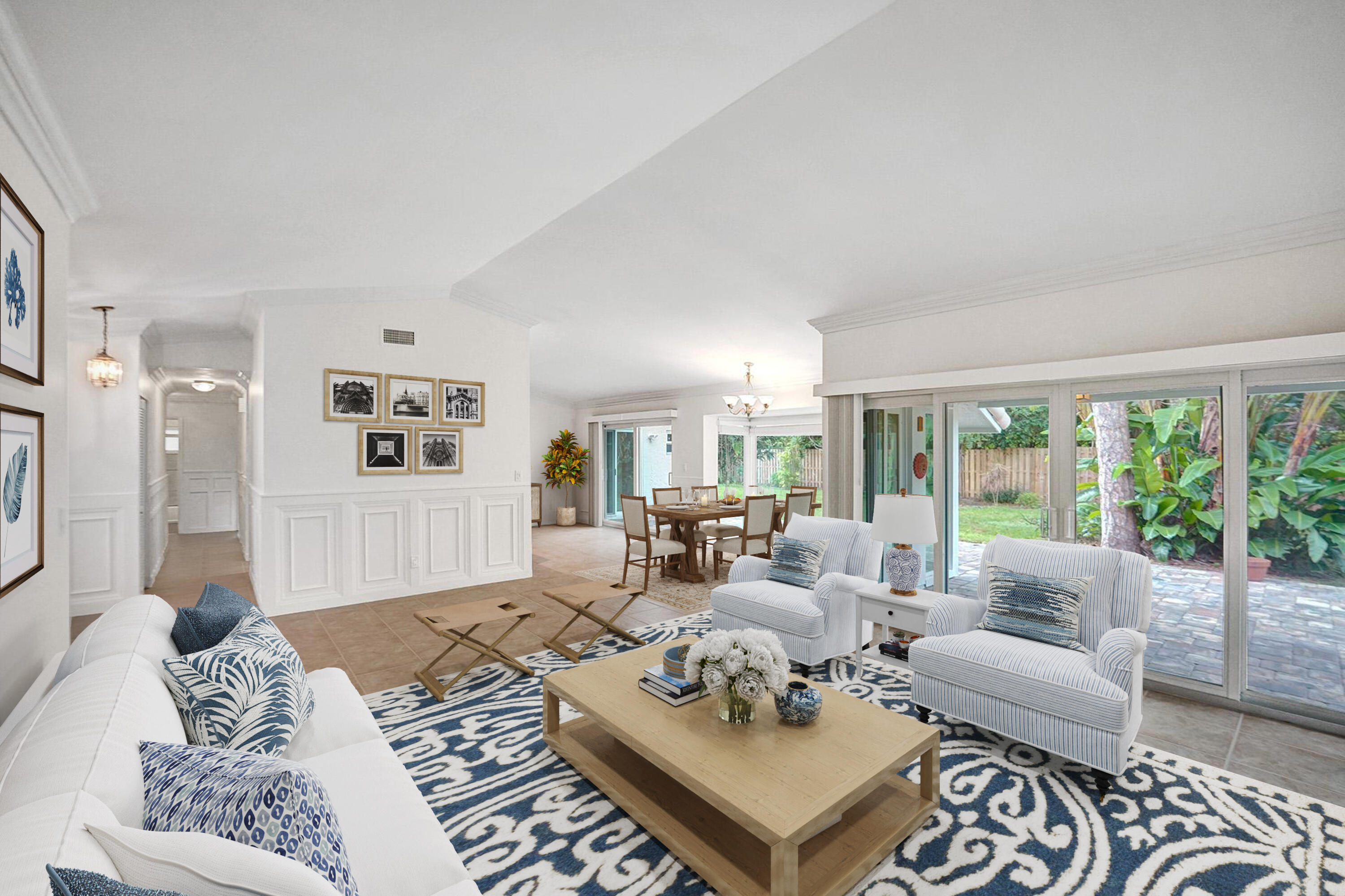 2941 Northwest 24th Way Boca Raton, FL 33431 - Photo 8 of 53 a living room with furniture and a large window with garden view