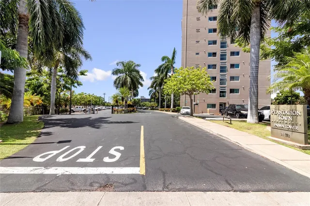 a view of street with tall buildings