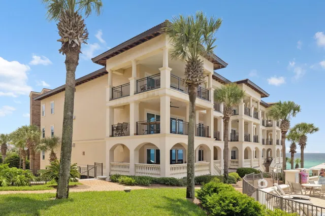 a front view of a building with garden