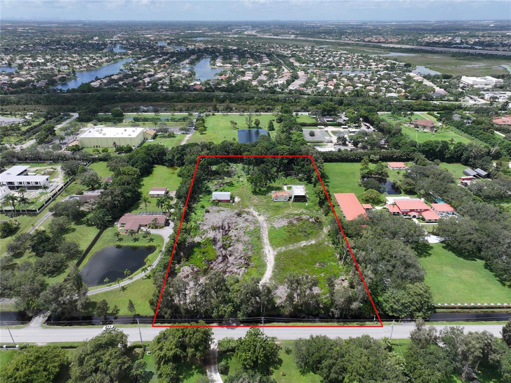 14390 Mustang Trail Southwest Ranches, FL 33330 - Photo 4 of 4 an aerial view of multiple house