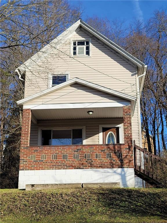 211 Summit Street Butler, PA 16001 - Photo 1 of 17 a front view of a house with garage