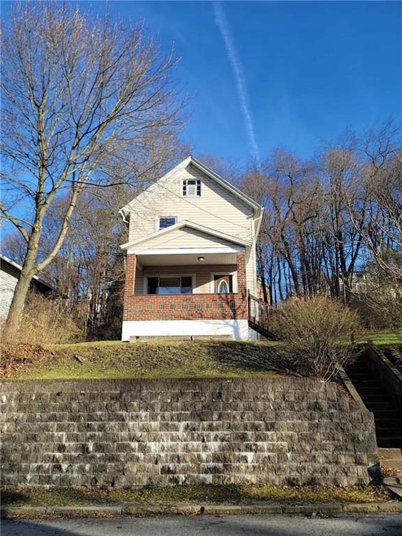 211 Summit Street Butler, PA 16001 - Photo 2 of 17 a front view of a house with a yard