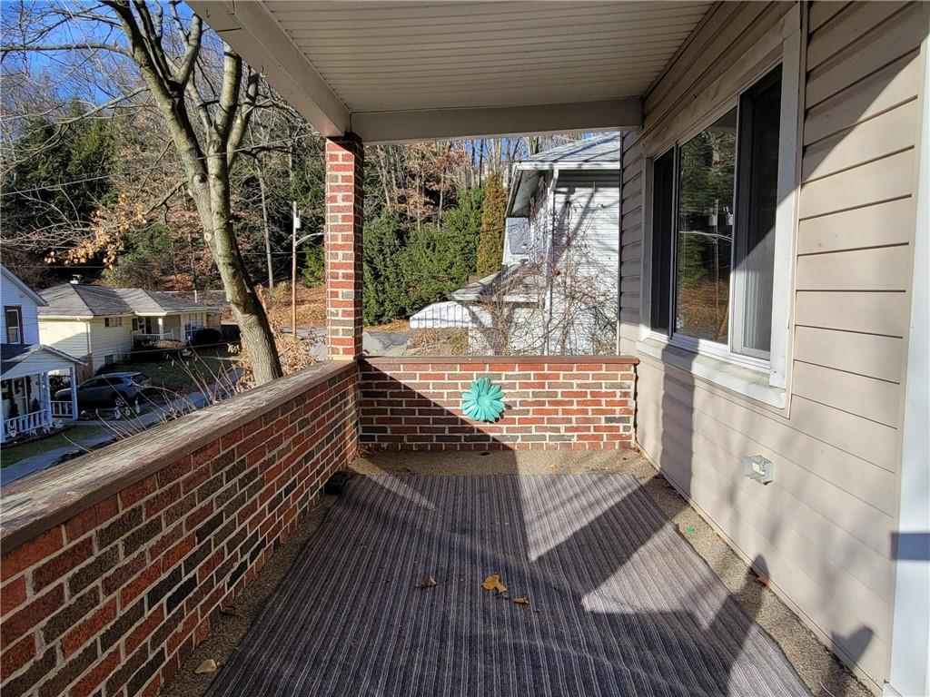211 Summit Street Butler, PA 16001 - Photo 15 of 17 a view of balcony with wooden floor