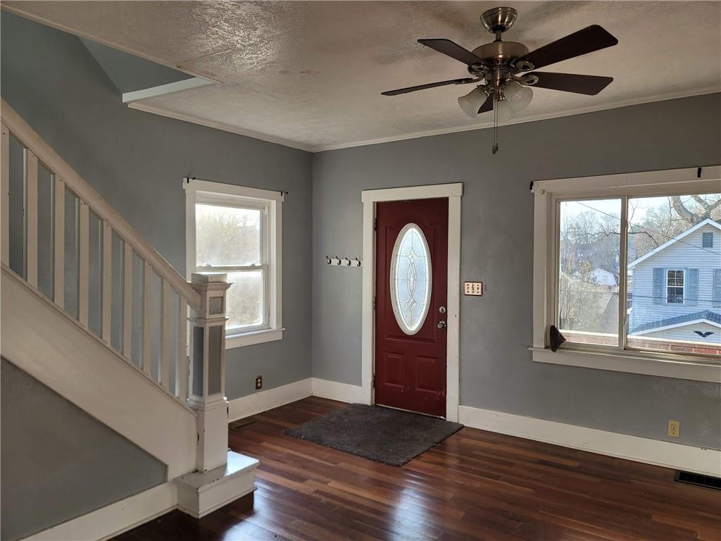 211 Summit Street Butler, PA 16001 - Photo 5 of 17 a view of an entryway with wooden floor and door