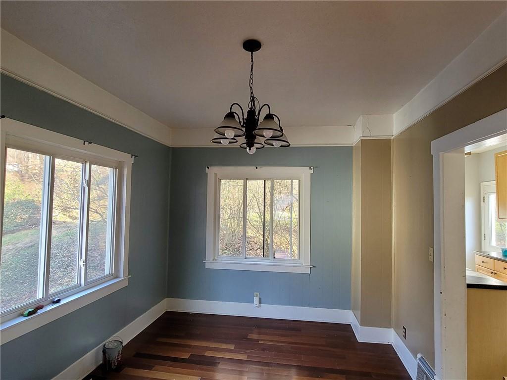 211 Summit Street Butler, PA 16001 - Photo 6 of 17 a room with window and wooden floor