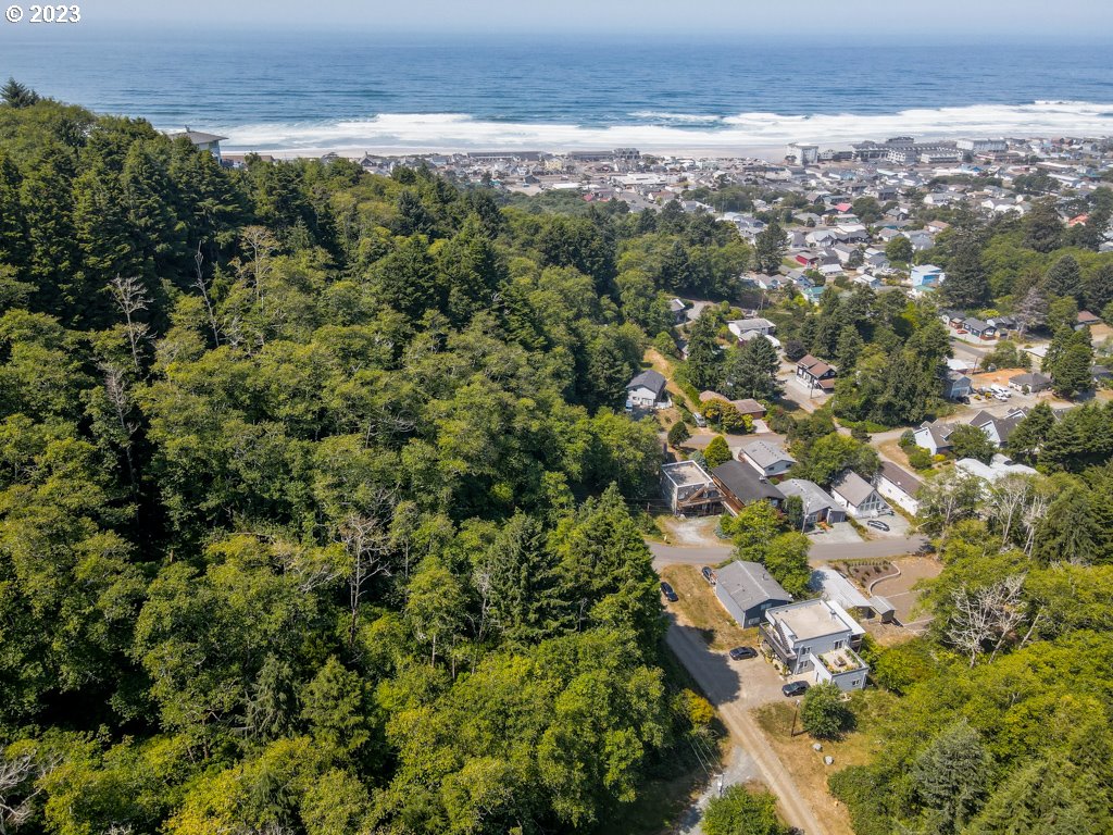 South 3rd Avenue Rockaway Beach, OR 97136 - Photo 6 of 7 an aerial view of a houses with a yard