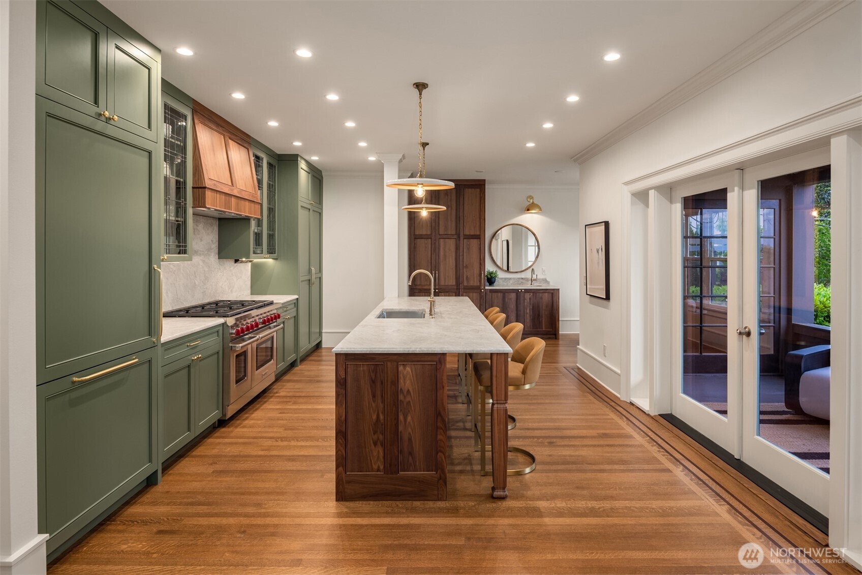 740 22nd Avenue East Seattle, WA 98112 - Photo 12 of 40 a large kitchen with stainless steel appliances kitchen island granite countertop a large counter top and stainless steel appliances