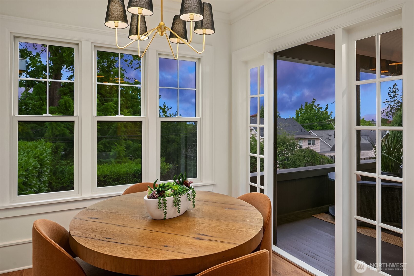 740 22nd Avenue East Seattle, WA 98112 - Photo 15 of 40 a view of a dining room with a table and chairs