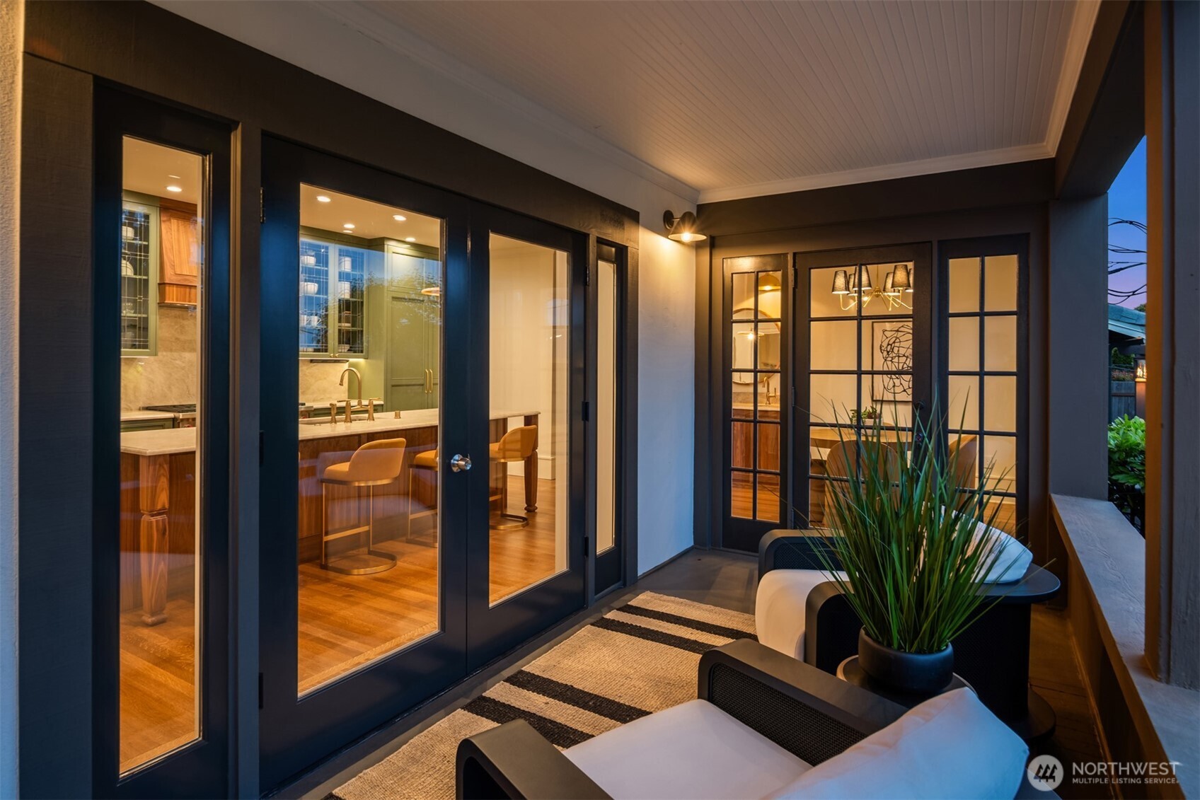 740 22nd Avenue East Seattle, WA 98112 - Photo 17 of 40 a view of a livingroom with furniture and floor to ceiling window