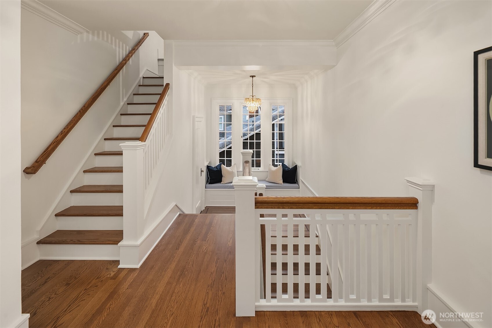 740 22nd Avenue East Seattle, WA 98112 - Photo 18 of 40 a view of a living room with wooden floor and stairs