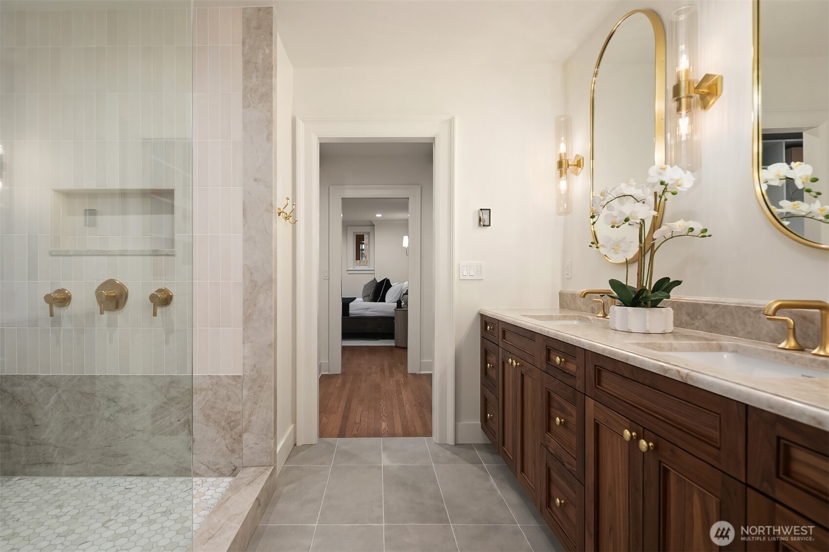 740 22nd Avenue East Seattle, WA 98112 - Photo 23 of 40 a spacious bathroom with a granite countertop sink a mirror and a shower